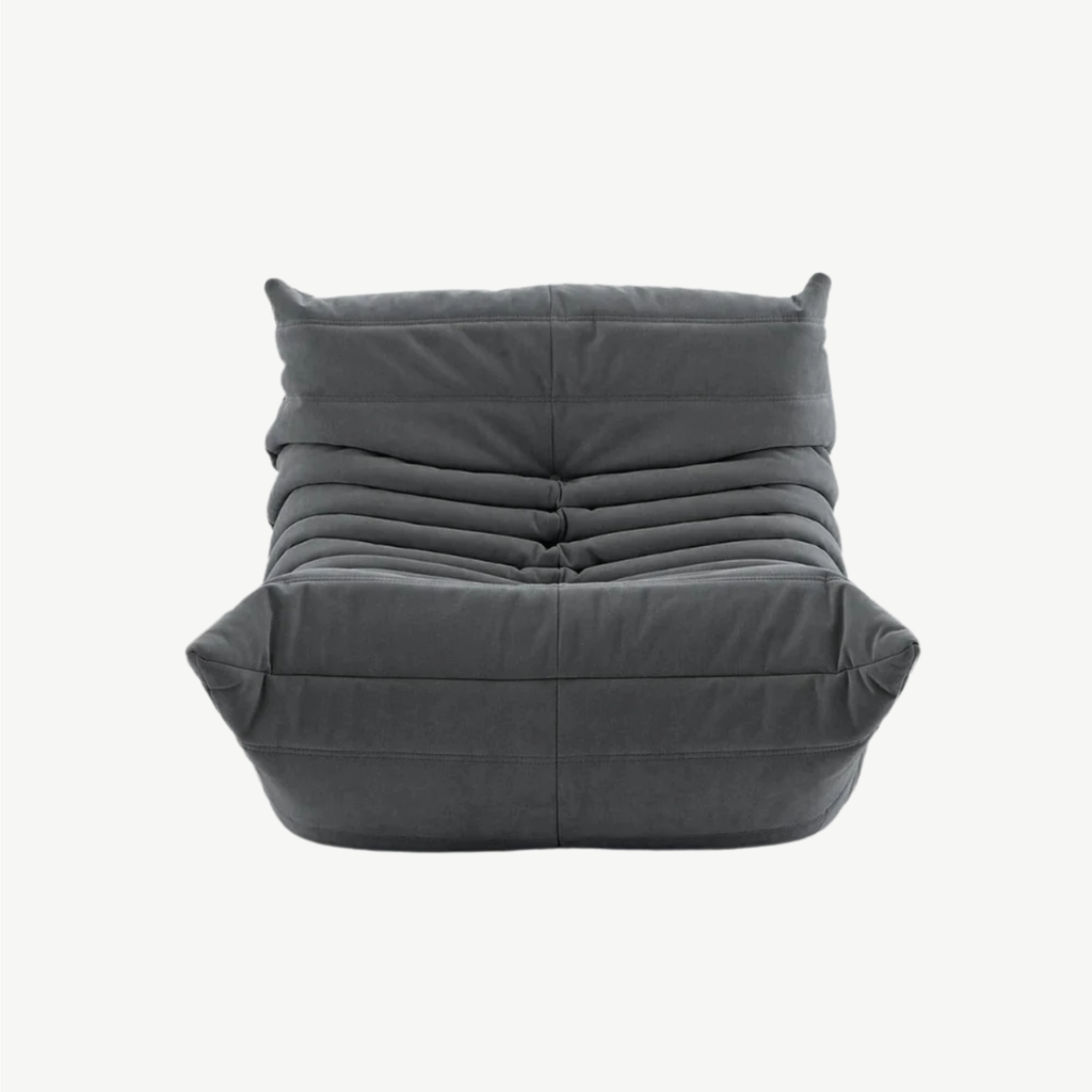 LUMA Mini low lounge chair in Charcoal – studio view