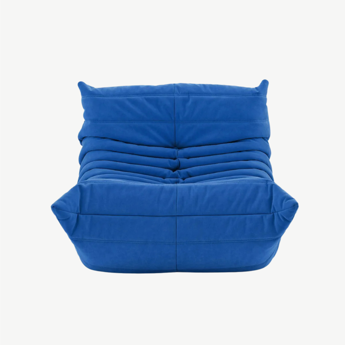 LUMA Mini low lounge chair in Cobalt – studio view
