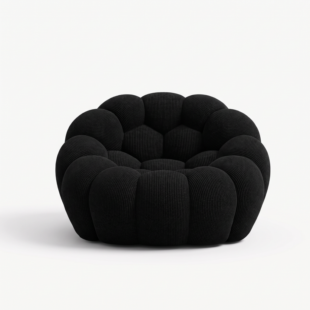 BULÉA Mini round armchair in Ebony – studio view