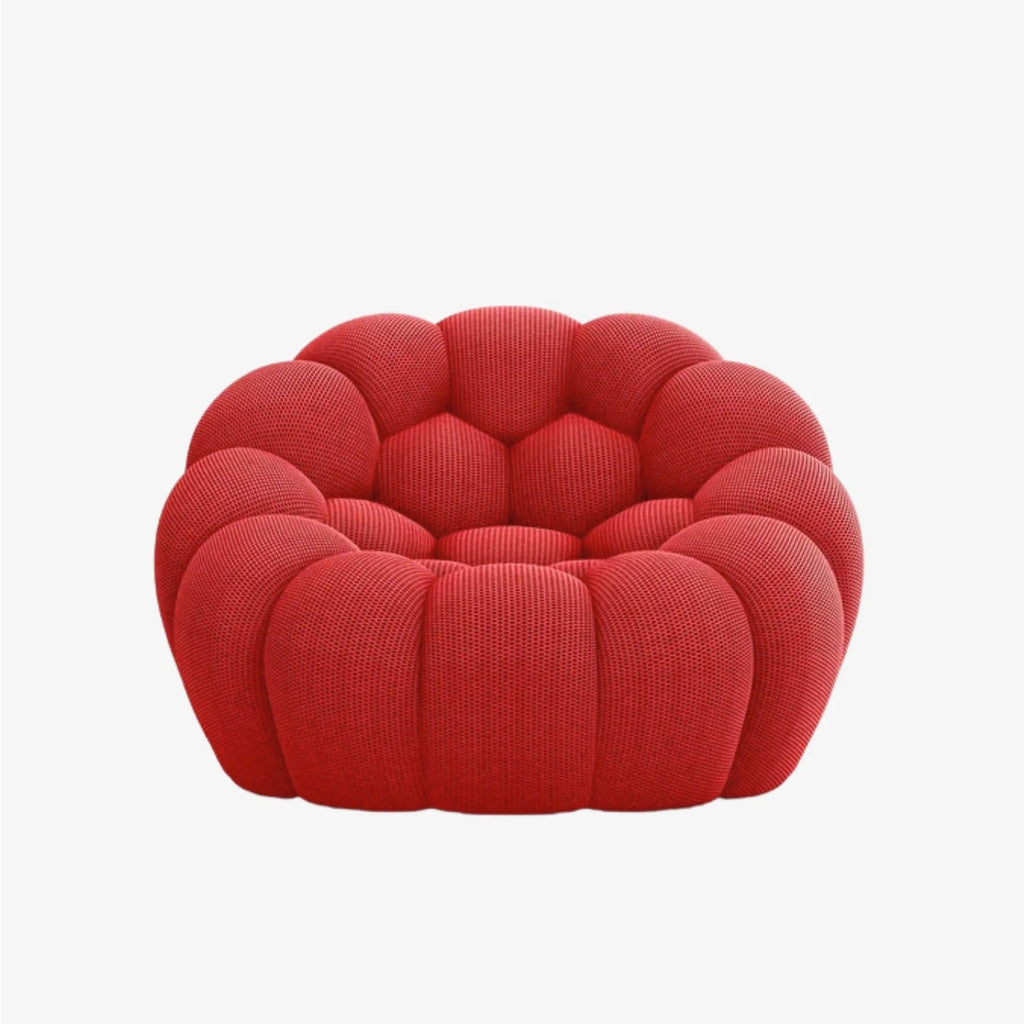 BULÉA Mini round armchair in Coral – studio view