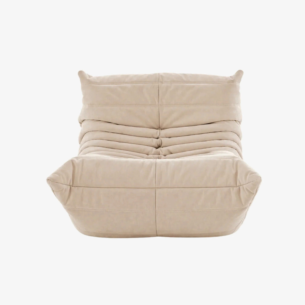 LUMA Mini low lounge chair in Sand – studio view